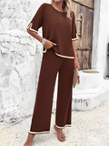 Conjunto em Viscose com Blusa Mullet de Manga Curta e Calça Cintura Alta com Fenda na Barra