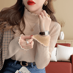 Blusa Peluciada e Canelada com Gola Alta